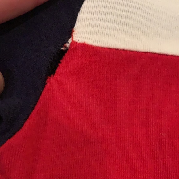 This is a relatively new shirt but sadly there is a small hole in it. - Picture 3 of 3